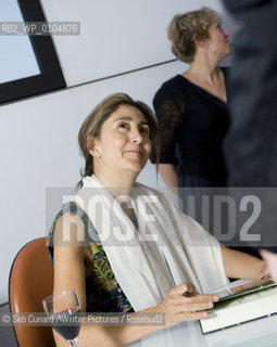 Ingrid Betancourt signing books at “Ingrid Betancourt: Even Silence Has An End.  .In conversation with John McCarthy”, Congress Centre, London, October 6, 2010. ..Copyright©Seb Cunard/Writer Pictures/Rosebud2