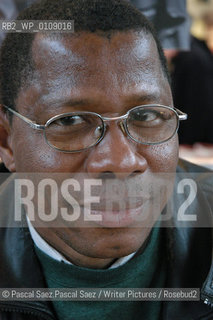  writer Ousmane Diarra  at the Salon du Livre (Book Fair) in Paris, March 2006..Copyright©Pascal Saez.Pascal Saez/Writer Pictures/Rosebud2