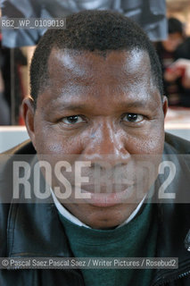  writer Ousmane Diarra  at the Salon du Livre (Book Fair) in Paris, March 2006..Copyright©Pascal Saez.Pascal Saez/Writer Pictures/Rosebud2