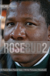  writer Ousmane Diarra  at the Salon du Livre (Book Fair) in Paris, March 2006..Copyright©Pascal Saez.Pascal Saez/Writer Pictures/Rosebud2