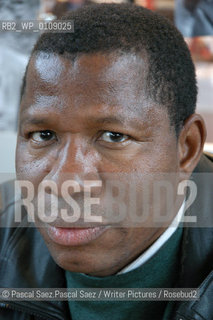  writer Ousmane Diarra  at the Salon du Livre (Book Fair) in Paris, March 2006..Copyright©Pascal Saez.Pascal Saez/Writer Pictures/Rosebud2