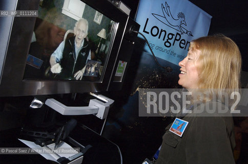 Catherine Lockerbie, director of the Edinburgh International Book Festival is talking to american author Norman Mailer through the video link of canadian writer Margaret Atwoods invention the Long Pen. The Long Pen allows writers to remotely sign copies of their books.  Edinburgh International Book Festival 2007. ..Copyright©Pascal Saez/Writer Pictures/Rosebud2