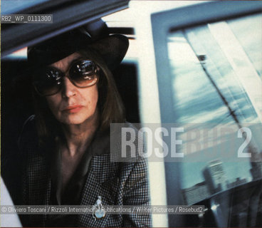 Italian journalist Oriana Fallaci sits in the back of a car in this undated file photo. ....Copyright©Oliviero Toscani/Rizzoli International Publications/Writer Pictures/Rosebud2
