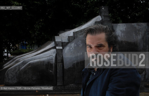 Childrens Author - Charlie Fletcher beside an Eduardo Paolozzi  sculpture in Edinburgh...copyright©Neil Hanna/TSPL/Writer Pictures/Rosebud2