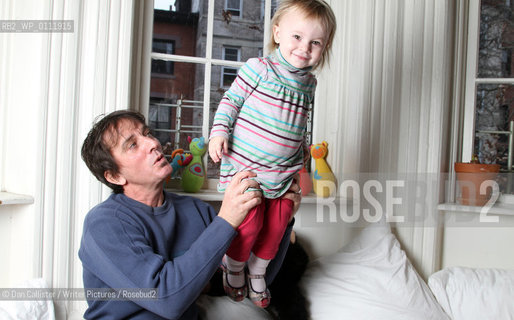 Nick Flynn and his daughter Maeve (aged 2) at home in Brooklyn, New York, USA.  ..copyright©Dan Callister/Writer Pictures/Rosebud2