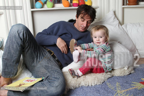 Nick Flynn and his daughter Maeve (aged 2) at home in Brooklyn, New York, USA.  ..copyright©Dan Callister/Writer Pictures/Rosebud2