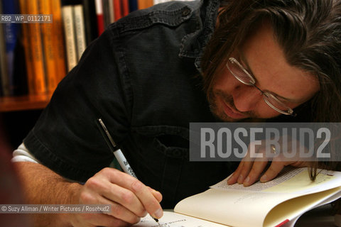 NEW YORK, NY - JAN 11, 2006:  Essayist David Foster Wallace at The Strand bookstore in Manhattan, New York, on Wednesday, January 11, 2006.  Wallace read from and signed his book, Consider the Lobster.  ....Copyright©Suzy Allman/Writer Pictures/Rosebud2