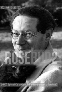 Lion Feuchtwanger enjoying a pleasant moment with one of his cats....Copyright©USC Special Collections//Writer Pictures/Rosebud2