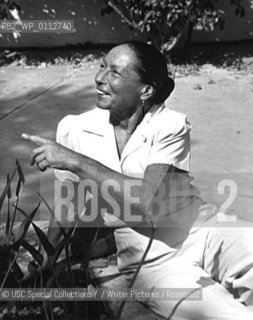 Marta Feuchtwanger seated in Villa Auroras front courtyard. She was a great lover of the outdoors and gardening....Copyright©USC Special Collections//Writer Pictures/Rosebud2