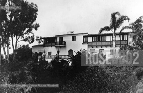 Feuchtwangers former residence, Villa Aurora, in Pacific Palisades, California, with a view from the southwest. The 5000 square foot Villa was constructed in the late 1920s by the Los Angeles Times as a demonstration home and the progress of the construction was reported in weekly articles between 1927-28. The Feuchtwangers purchased the house in 1943....Copyright©USC Special Collections//Writer Pictures/Rosebud2