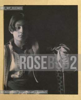 TITLE:  [Kahlil Gibran in Middle Eastern(?) costume with leopard skin and staff, seated]..©CALL NUMB/Writer Pictures/Rosebud2