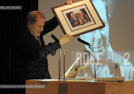 Tony Harrison wins inaugural PEN/Pinter prize presented by the late Pinters wife Lady Antonia Fraser at the British Library October 14 2009.  Tony received a a cartoon by Steve Bell , the cartoon which lampooned Blair and Bush over their instigation of the Iraq war first appeared in the Guardian on October 14 2005 ..copyright©Nick Cunard/Writer Pictures/Rosebud2