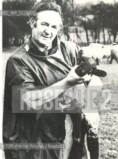 Author James Herriot holding a lamb, c. 1960s..copyright©TSPL/Writer Pictures/Rosebud2