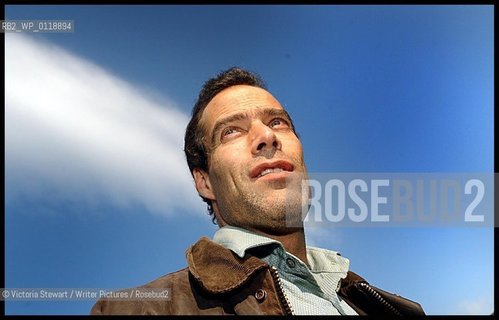 Sebastian Junger, American author, journalist, and documentary filmmaker, with his novel Fire, in Glasgow, Scotland, 18/09/2001...copyright©Victoria Stewart/Writer Pictures/Rosebud2