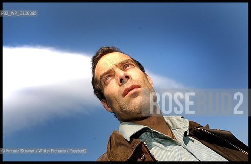 Sebastian Junger, American author, journalist, and documentary filmmaker, with his novel Fire, in Glasgow, Scotland, 18/09/2001...copyright©Victoria Stewart/Writer Pictures/Rosebud2