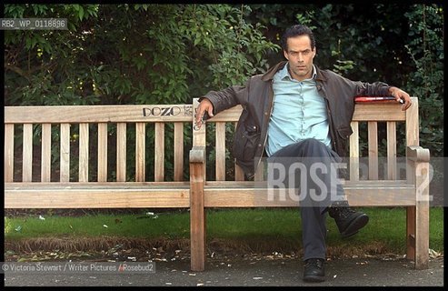 Sebastian Junger, American author, journalist, and documentary filmmaker, with his novel Fire, in Glasgow, Scotland, 18/09/2001...copyright©Victoria Stewart/Writer Pictures/Rosebud2