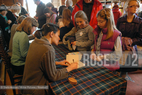 Linda Newbery and Elen Caldecott signing books for young readers during the 2nd annual Lennoxlove Book Festival at Lennoxlove House, Haddington, Scotland, November 20, 2010. ..Copyright©Sheila Masson/Writer Pictures/Rosebud2