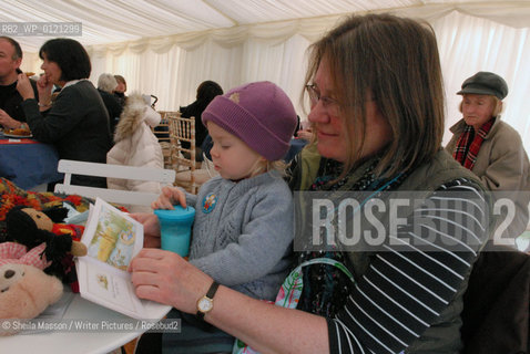 A young reader gets some guidance in the cafe marquee during the 2nd annual Lennoxlove Book Festival at Lennoxlove House, Haddington, Scotland, November 20, 2010. ..Copyright©Sheila Masson/Writer Pictures/Rosebud2