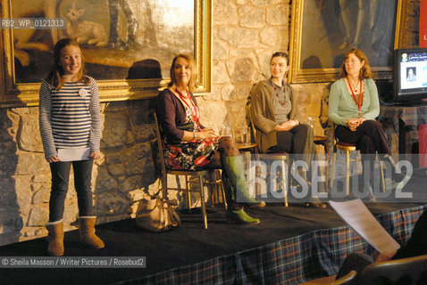 A young reader poses a question to Maggi Gibson, Elen Caldecott and Linda Newbery, British writers, at the 2nd annual Lennoxlove Book Festival at Lennoxlove House, Haddington, Scotland, November 20, 2010. ..Copyright©Sheila Masson/Writer Pictures/Rosebud2