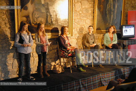 Two young readers pose questions to Maggi Gibson, Elen Caldecott and Linda Newbery, British writers, at the 2nd annual Lennoxlove Book Festival at Lennoxlove House, Haddington, Scotland, November 20, 2010. ..Copyright©Sheila Masson/Writer Pictures/Rosebud2