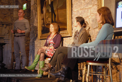 Simon King prepares to announce the first Lennox award as Maggi Gibson, Elen Caldecott and Linda Newbery, British writers, look on, at the 2nd annual Lennoxlove Book Festival at Lennoxlove House, Haddington, Scotland, November 20, 2010. ..Copyright©Sheila Masson/Writer Pictures/Rosebud2