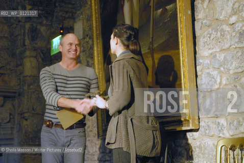 Simon King congratulates the first Lennox award winner Elen Caldecott, at the 2nd annual Lennoxlove Book Festival at Lennoxlove House, Haddington, Scotland, November 20, 2010. ..Copyright©Sheila Masson/Writer Pictures/Rosebud2