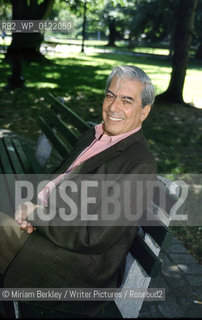 Mario Vargas Llosa sitting on a park bench in Boston, MA, October 7, 2010. ..©Miriam Berkley/Writer Pictures/Rosebud2