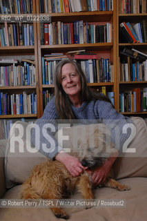 Author Sara Maitland, her isolated cottage in moorland in Galloway in the background. Seen in front of her bookshelf. With her pet dog Zoe..29th Oct 2008....Copyright©Robert Perry/TSPL/Writer Pictures/Rosebud2