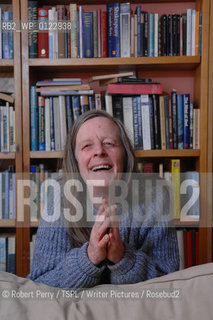 Author Sara Maitland, her isolated cottage in moorland in Galloway in the background. Seen in front of her bookshelf...29th Oct 2008....Copyright©Robert Perry/TSPL/Writer Pictures/Rosebud2