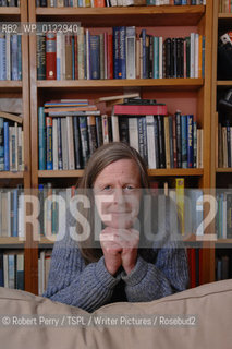 Author Sara Maitland, her isolated cottage in moorland in Galloway in the background. Seen in front of her bookshelf...29th Oct 2008....Copyright©Robert Perry/TSPL/Writer Pictures/Rosebud2