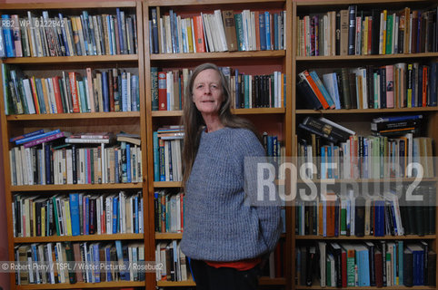 Author Sara Maitland, her isolated cottage in moorland in Galloway in the background. Seen in front of her bookshelf...29th Oct 2008....Copyright©Robert Perry/TSPL/Writer Pictures/Rosebud2
