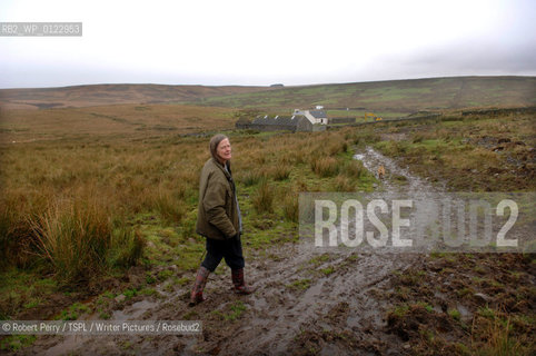Author Sara Maitland, her isolated cottage in moorland in Galloway in the background..29th Oct 2008....Copyright©Robert Perry/TSPL/Writer Pictures/Rosebud2
