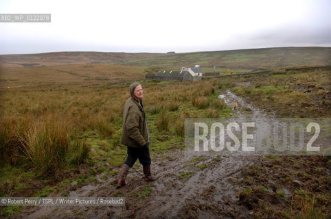 Author Sara Maitland, her isolated cottage in moorland in Galloway in the background..29th Oct 2008....Copyright©Robert Perry/TSPL/Writer Pictures/Rosebud2