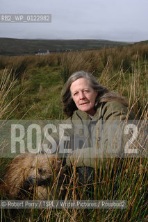 Author Sara Maitland, her isolated cottage in moorland in Galloway in the background. With her pet dog Zoe...29th Oct 2008....Copyright©Robert Perry/TSPL/Writer Pictures/Rosebud2