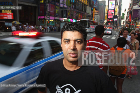 Fekkak Mamdouh, Moroccan-born American author and organizer, in Times Square, New York City, July 29, 2008. ..Copyright©Brian Palmer/Writer Pictures/Rosebud2