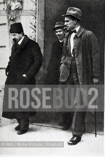 Vladimir Mayakovsky (1894-1930).Soviet poet, playwright and propogandist..Pictured right with unknown persons..Copyright©NMG/Writer Pictures/Rosebud2
