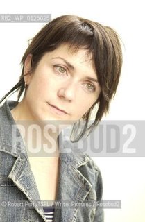 Denise Mina, author, in her Glasgow flat. .copyright©Robert PerryTSPL/Writer Pictures/Rosebud2