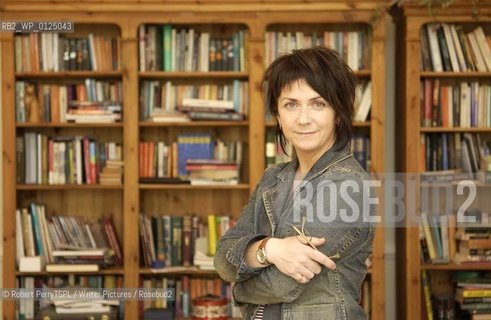 Denise Mina, author, in her Glasgow flat. .copyright©Robert PerryTSPL/Writer Pictures/Rosebud2