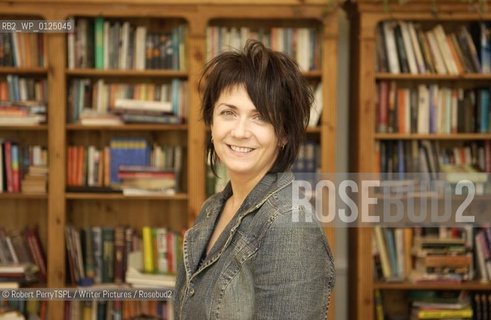 Denise Mina, author, in her Glasgow flat. .copyright©Robert PerryTSPL/Writer Pictures/Rosebud2