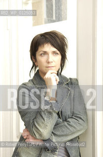 Denise Mina, author, in her Glasgow flat. .copyright©Robert PerryTSPL/Writer Pictures/Rosebud2