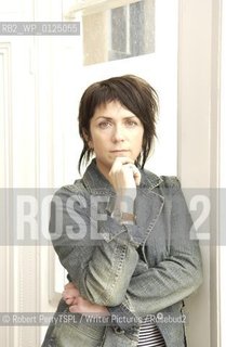Denise Mina, author, in her Glasgow flat. .copyright©Robert PerryTSPL/Writer Pictures/Rosebud2
