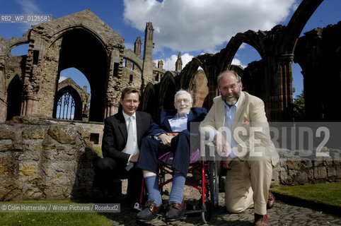 Scottish Poet and Writer Edwin Morgan poses for photographs with ceremony host Rory Bremner and (?) from prize sponsor Sundial Properties at Melrose Abbey in the Scottish Borders.Taken at the Sundial Scottish Arts Council Book of the Year Award..His book of poetry, A Book of Lives, took the overall prize..copyright©Colin Hattersley/Writer Pictures/Rosebud2
