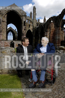 Scottish Poet and Writer Edwin Morgan poses for photographs with (?) from prize sponsor Sundial Properties at Melrose Abbey in the Scottish Borders.Taken at the Sundial Scottish Arts Council Book of the Year Award..His book of poetry, A Book of Lives, took the overall prize..copyright©Colin Hattersley/Writer Pictures/Rosebud2