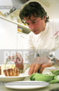 Jean-Christophe Novelli of Michelin starred Auberge du Lac and Novelli puts the finishing touches to a dessert at a celebrity cook-athon for BBC Children in Need, Friday November 19 2004..©.Rogan MacDonald/Writer Pictures/Rosebud2