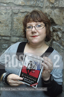 Scottish writer Louise Welsh, holding a copy of a new edition Of Robert Louis Stevensons Kidnapped, for which she wrote a preface..Here at the launch of the One Book-One Edinburgh campaign which will run throughout February 2007, and is designed to promote the reading of books in Edinburgh by getting the whole City reading the same book. The campaign is run by the Edinburgh UNESCO City of Litterature Trust, which commissioned the Kidnapped graphic novel, and the printing of thousands of copies of a new edition of R.L.Stevensons novel which will be distributed for free throughout the City..The launch was held at Edinburgh Castle and is part of a month-long series of events designed to boost awareness of reading, support literacy projects and engage with communities...Copyright©Pascal Saez/Writer Pictures/Rosebud2