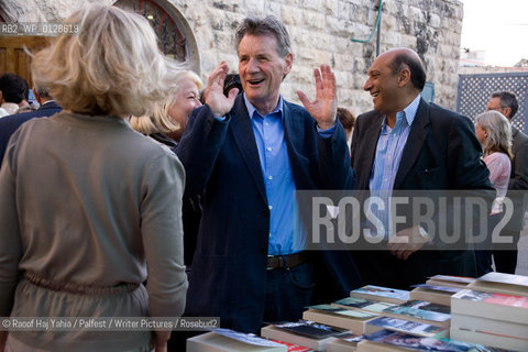 Palestine Festival of Literature 2009..Michael Palin chats with fellow attendees at the temporary bookshop outside the Palestine National Theatre....Copyright©Raoof Haj Yahia/Palfest/Writer Pictures/Rosebud2