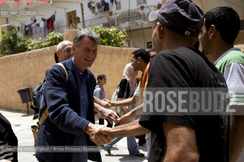 Palestine Festival of Literature 2009..Michael Palin greets locals in Jenin....Copyright©Raoof Haj Yahia/Palfest/Writer Pictures/Rosebud2