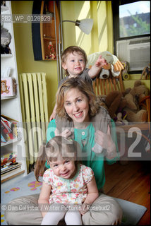 Pamela Paul and her children in their home in Harlem, New York, USA.   ..copyright©Dan Callister/Writer Pictures/Rosebud2