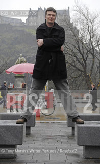 Crime Writer Ian Rankin in Edinburgh in front of Edinburgh Castle..Copyright©Tony Marsh/Writer Pictures/Rosebud2