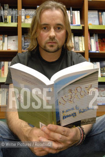 Danny Rhodes with a copy of his book, Asboville at a bookshop in Canterbury, Thursday ©Writer Pictures/Rosebud2